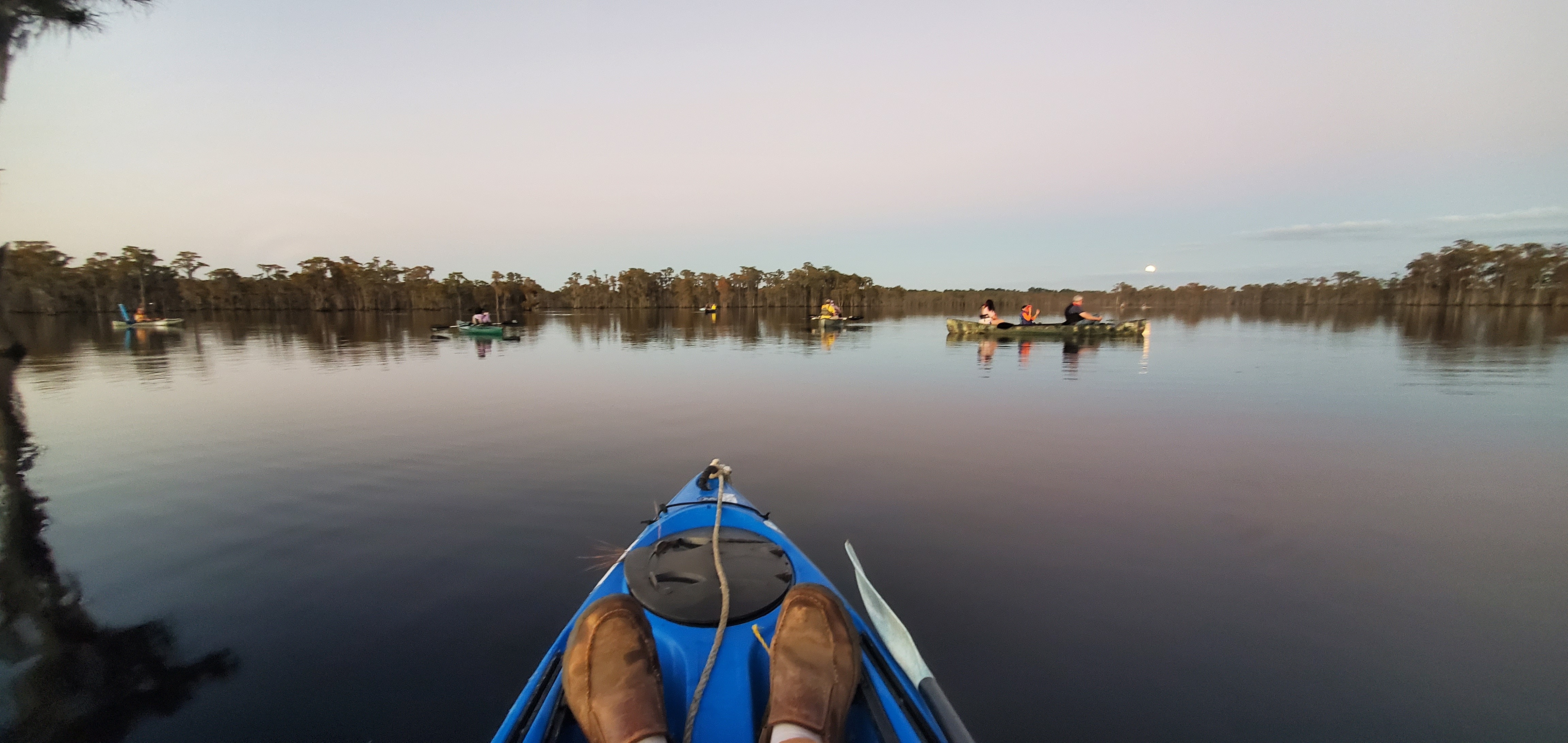 Many boats and moon in cloud