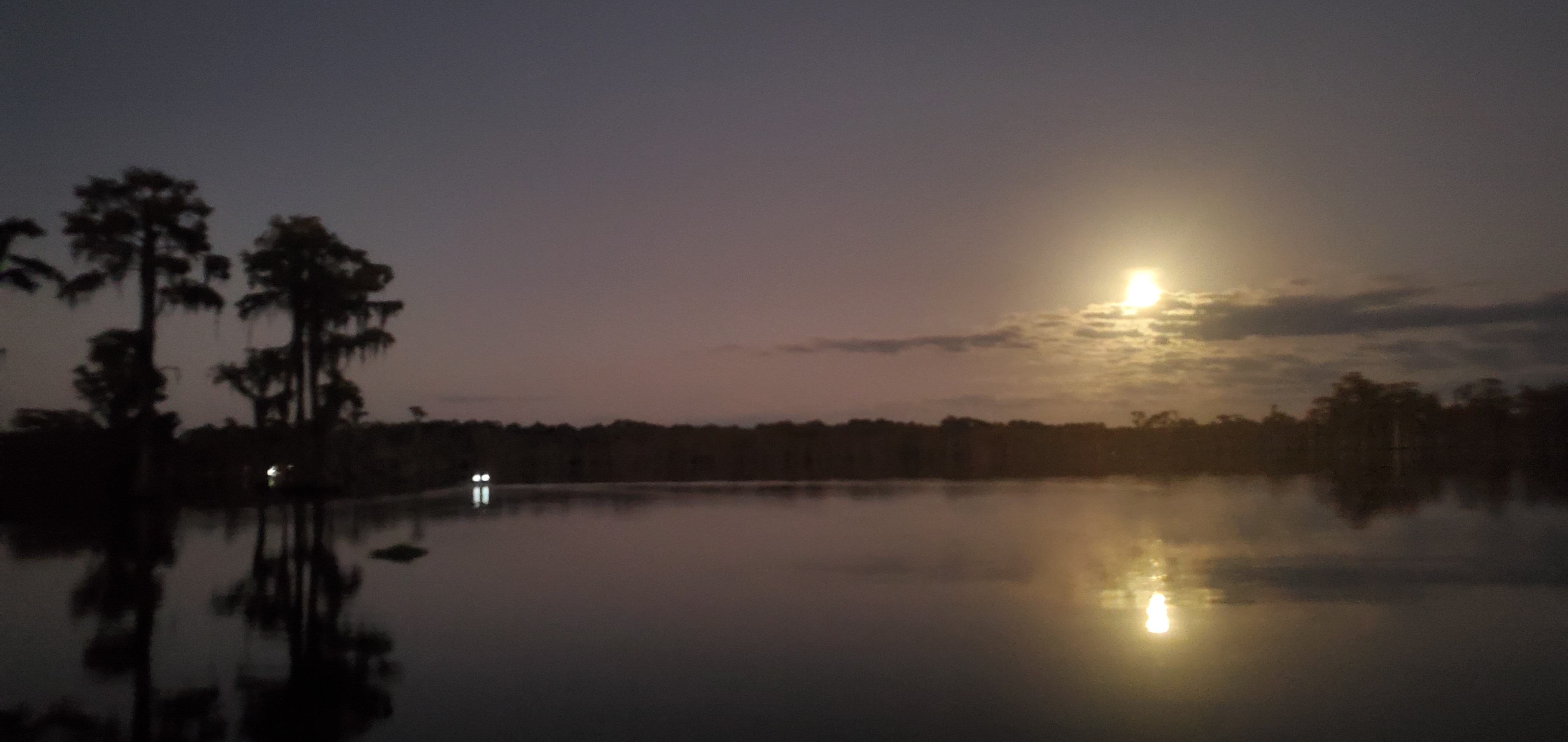 Boat lights moon