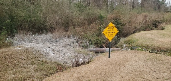 Drainage ditch, sign, spill, sewer line, 12:19:31, 30.8769252, -83.3130887