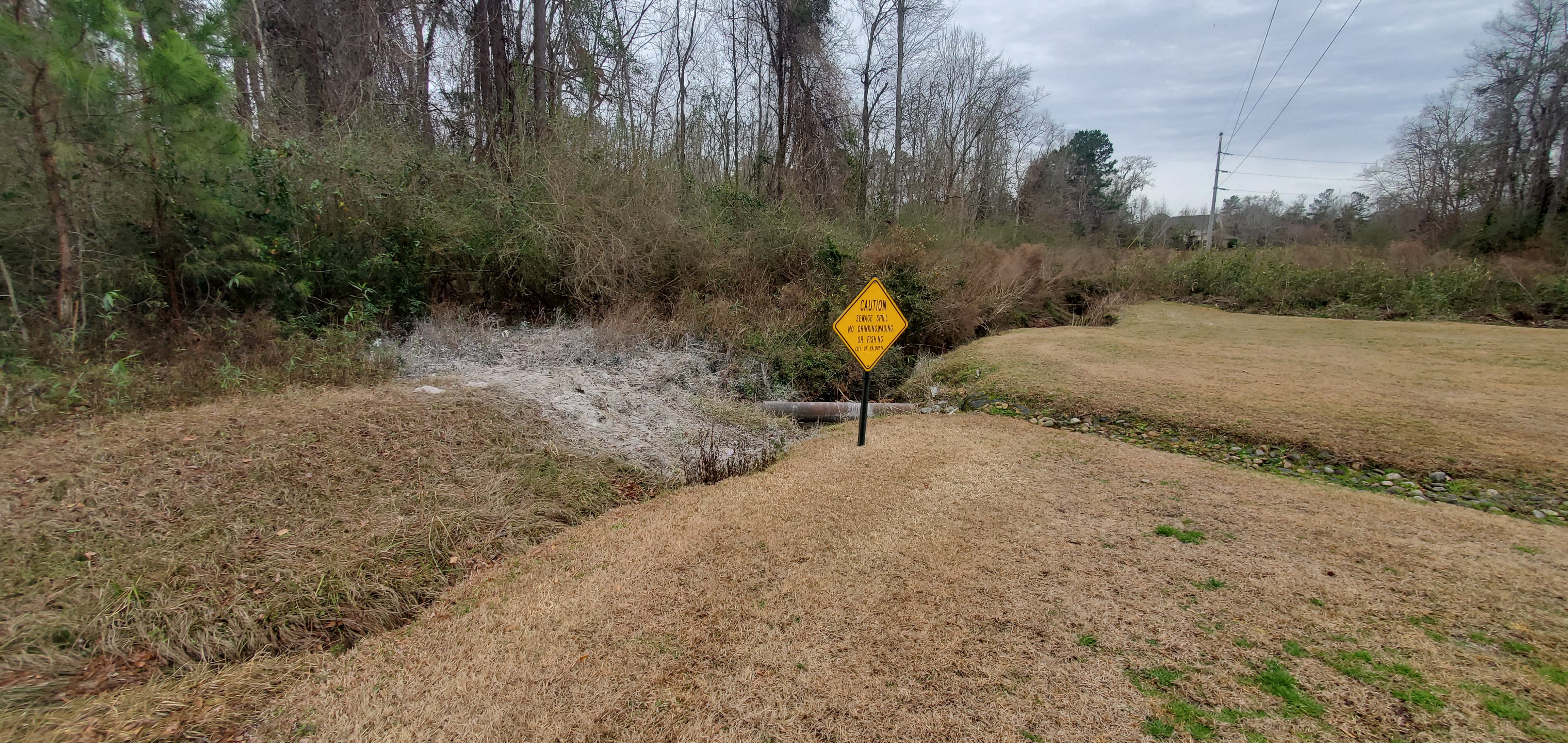 Power line, spill site, sign, 12:19:25, 30.8769252, -83.3130887