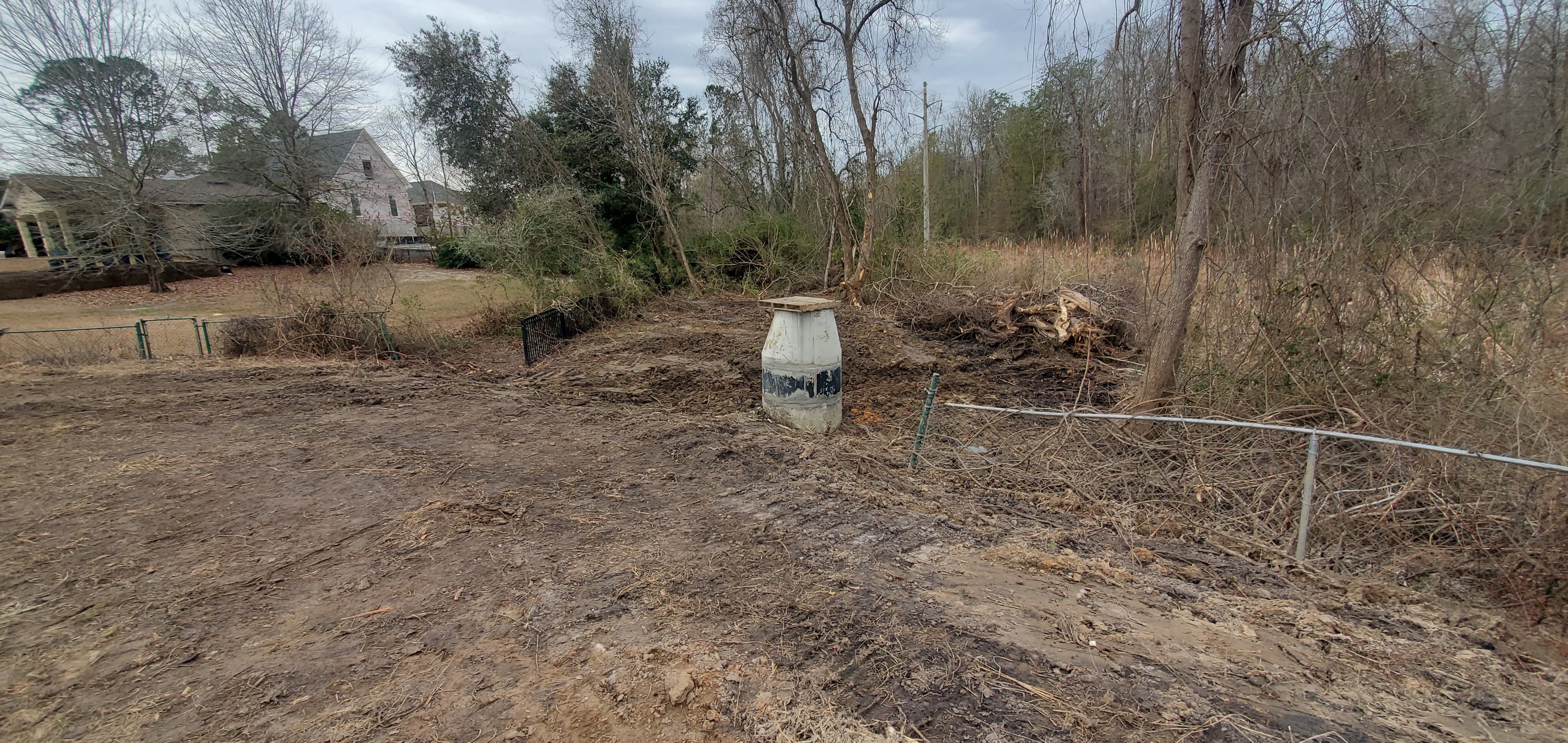 Raised manhole, Pebblewood Drive detention pond, 12:45:53, 30.8754372, -83.3141052