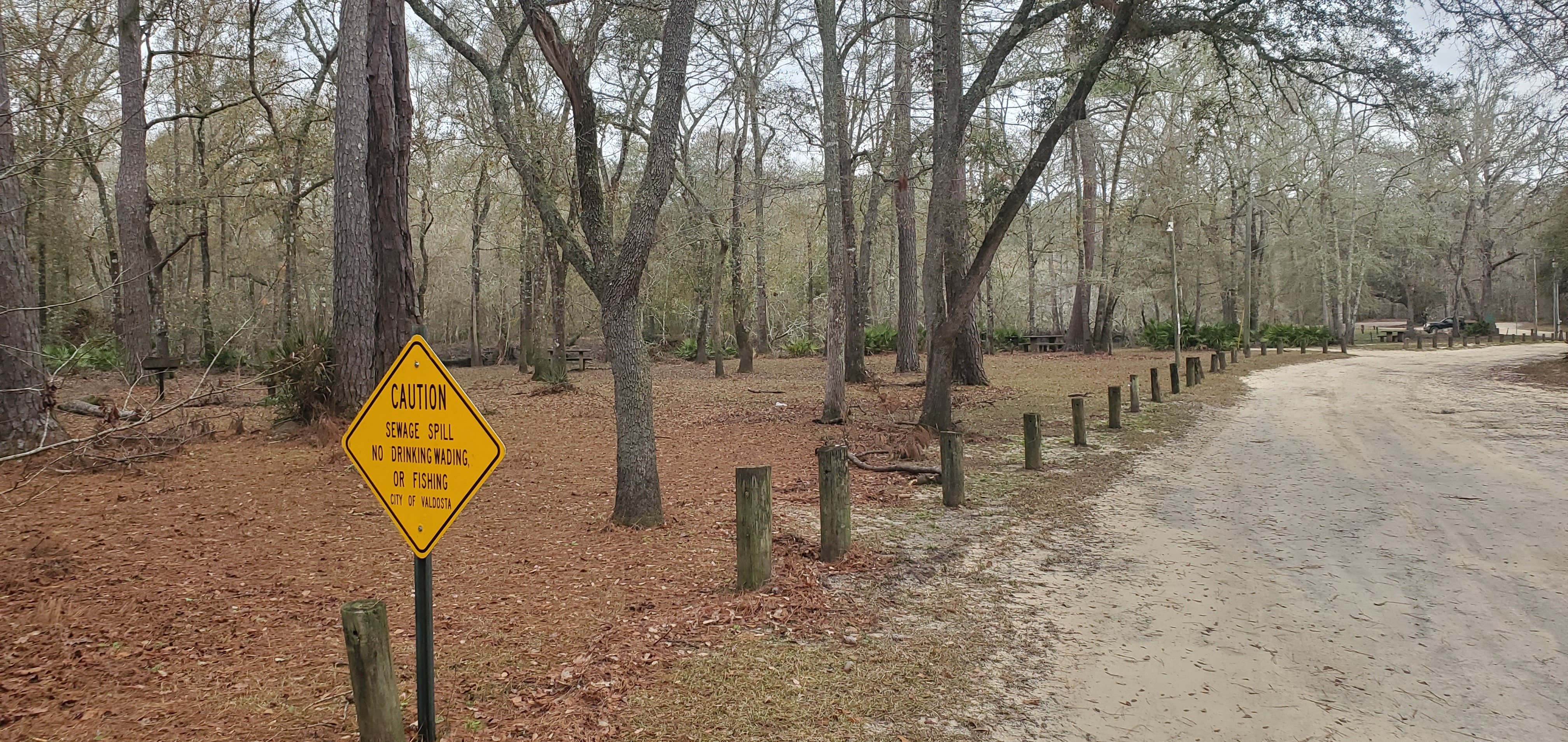 Sewage spill sign, 08:44:11, 30.8866932, -83.3231449