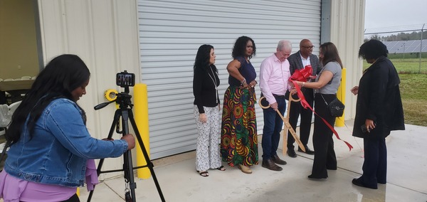 [Ribbon cutting]