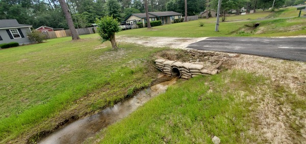 Eroded sandbags, Candleglow Trail, Little River 2024-04-16, 16:03:03, 30.8611193, -83.3634613