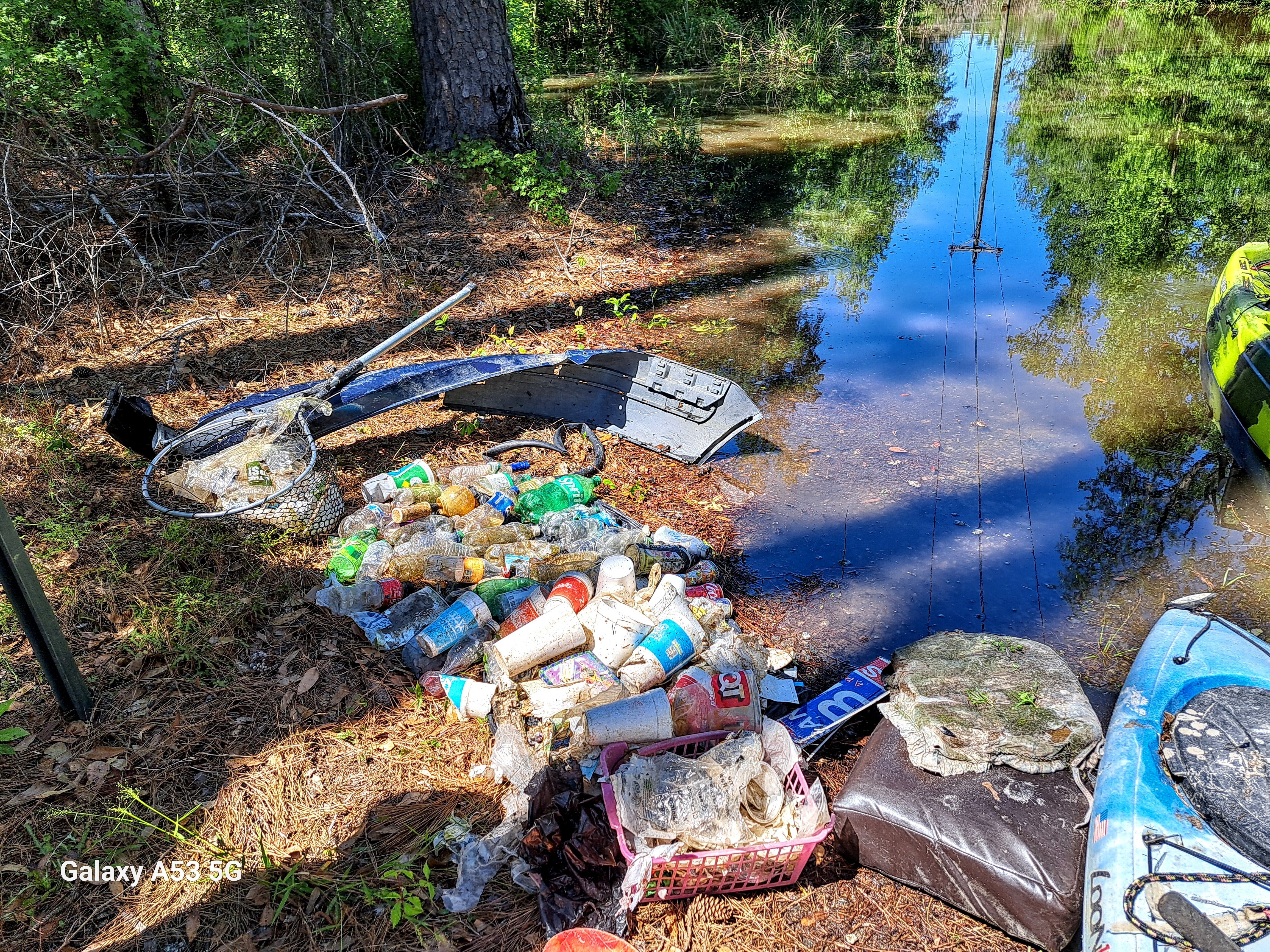 Trash, Train trestle, Sugar Creek, 2024-04-13