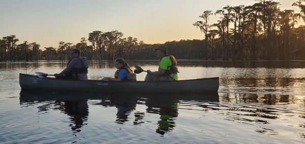 [Three in a canoe]