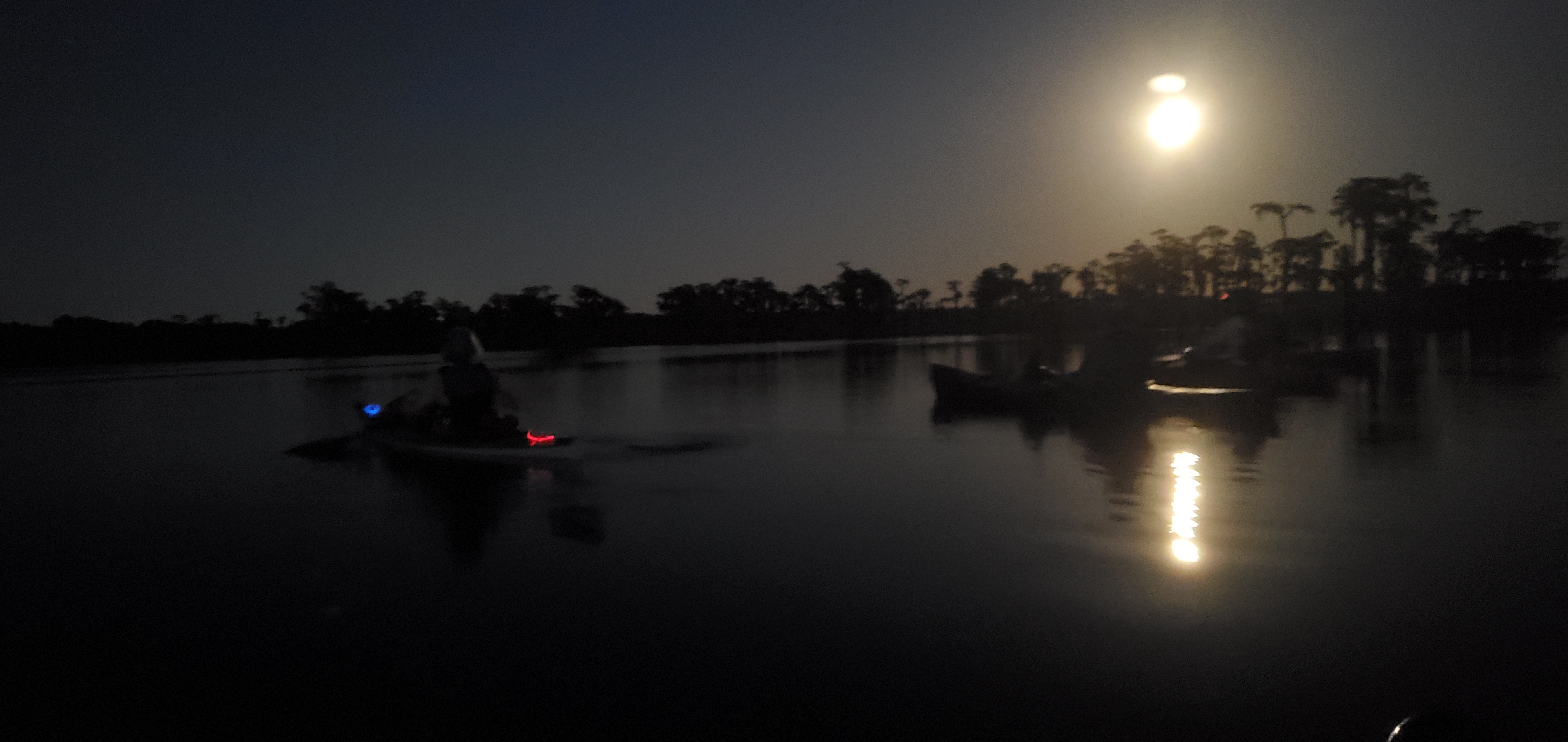 Boats and full moon getting high