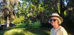 [Shirley Kokidko and the blooming tupelo tree]