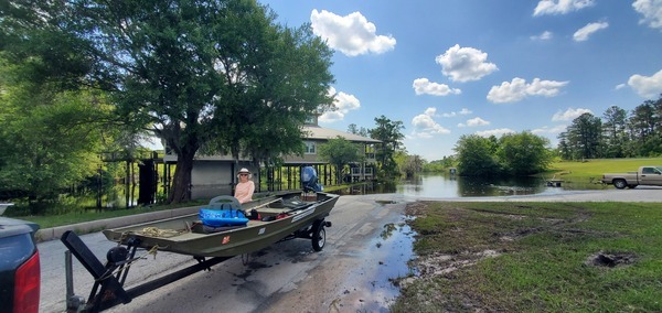 Context: Suwannee Riverkeeper vessel and outboard, Shirley Kokidko, Suwannee River Visitor Center, Fargo Ramp, 12:04:16, 30.6825714, -82.5606519