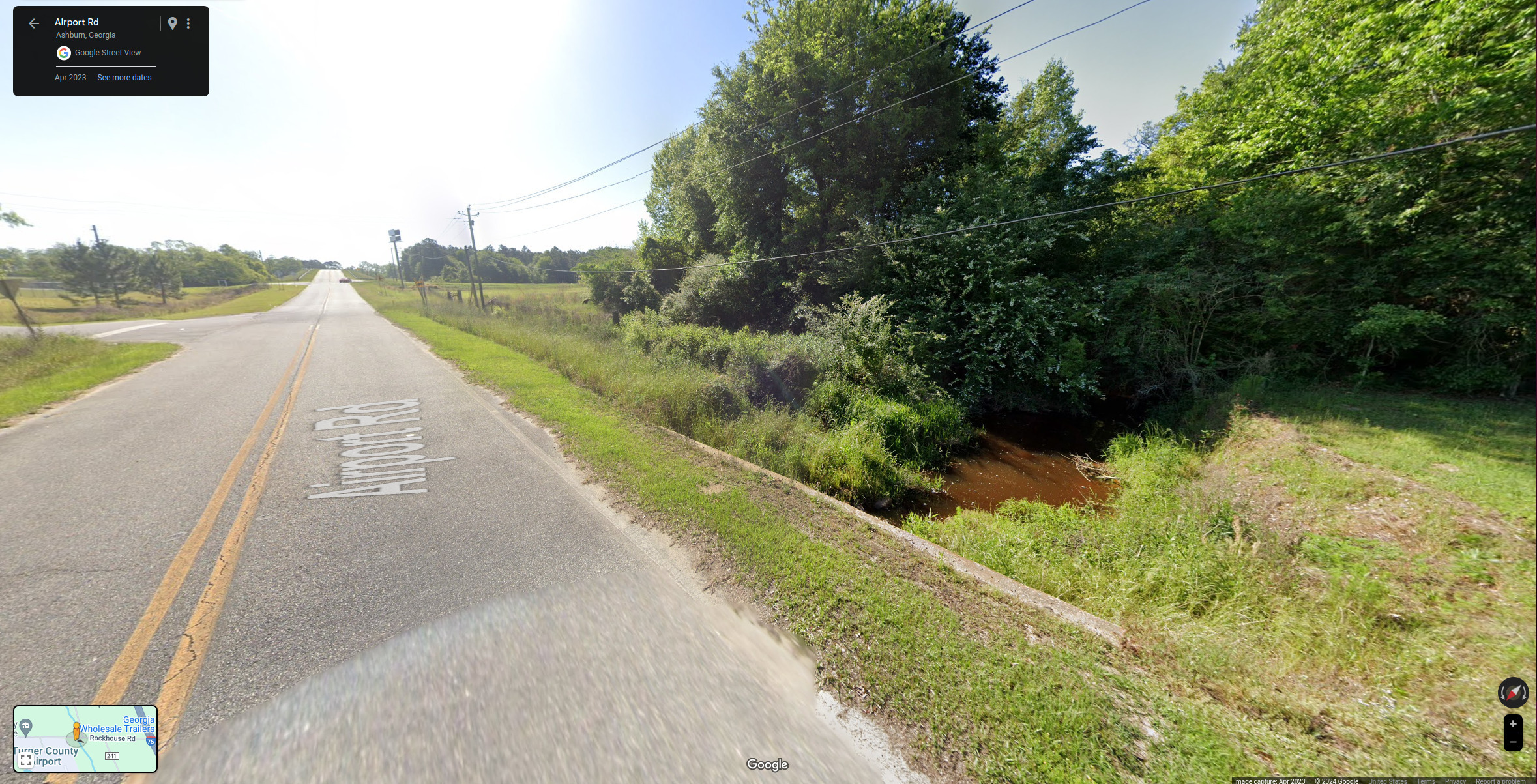 Hat Creek looking back east to spilling manhole at Sylvia Drive --Google Streetview