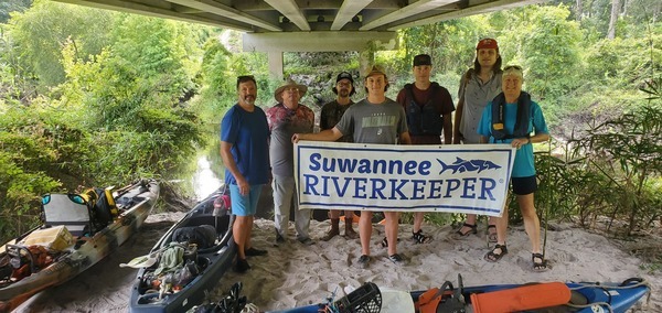 [Banners under the Alapahoochee River GA 135 Bridge, 2024:07:21 09:50:33, 30.6535663, -83.1225101]