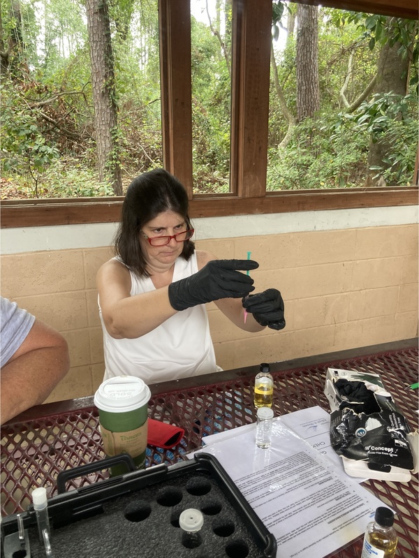 Janet checking the amount --Gretchen Quarterman