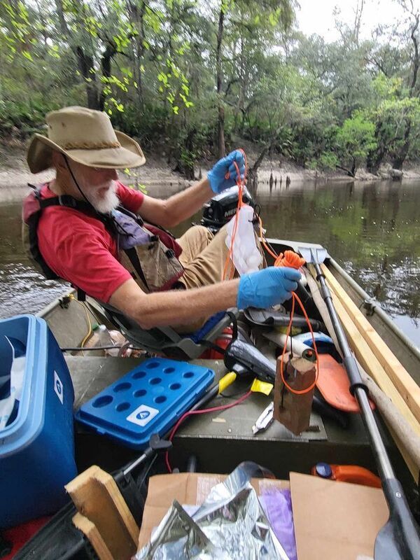 [Preparing the downstream PFAS sampler --Troy Toreson, 30.8284134, -83.3855957]