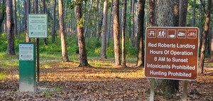 [Park signs, Red Roberts Landing --John S. Quarterman, 08:41:05, 31.1923103, -83.5205105]