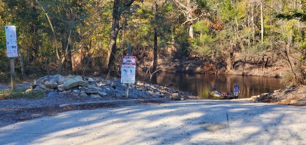 [WWALS water trail signs and jon boat at Troupville Boat Ramp, 10:02:18, 30.8513200, -83.3470027]