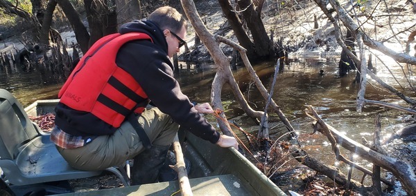 [PFAS collector under a mass of debris below Spring Branch, 13:49:49, 30.8285963, -83.3856886]