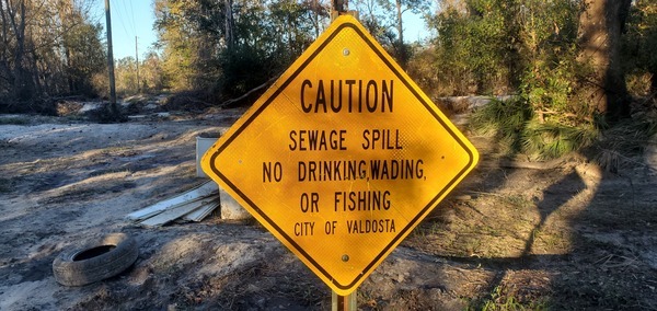 [Caution: Sewage Spill, No Drinking, Wading, or Fishing; City of Valdosta, Sugar Creek 2024-12-02]