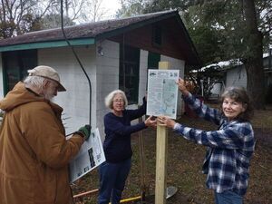 [Shirley and Linda with the top sign --Richard Fowler]