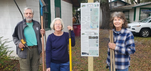 [Richard Fowler, Shirley Kokidko, Linda Tindall, at-water signs, Griffis Fish Camp]