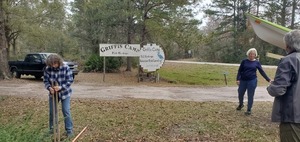 [Linda Tindall digging, Shirley Kokidko and Richard Fowler yakking at Griffis Fish Camp]