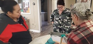 [WWALS Water Quality Testing Trainer Gretchen Quarterman shows the testing kit]