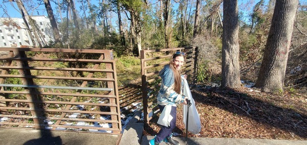 Sara at the fence gap, 10:35:40, 30.8431008, -83.2988311