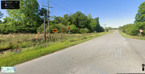 [Manhole with spill sign, Rockhouse Road at Sylvia Drive, Ashburn, GA --Google Streetview]