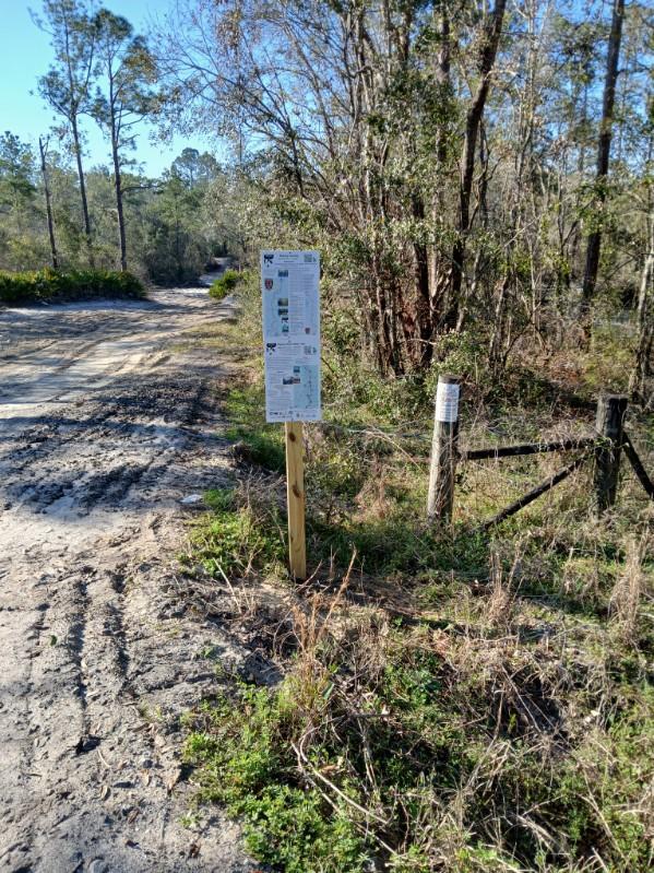 Access road and At-Water Signs