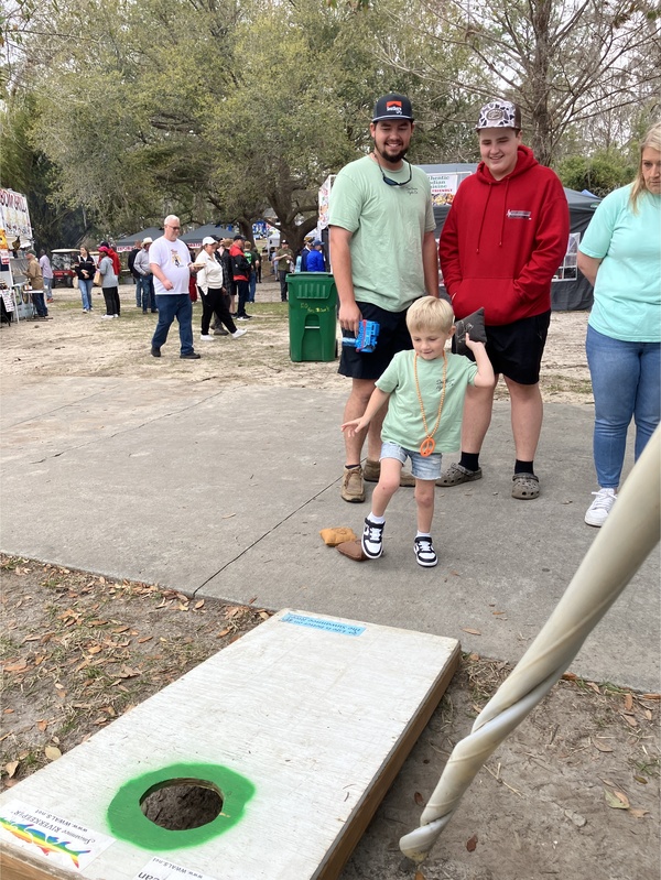 [Smaller Froggy Toss player, 2025:03:08 11:17:55 --Gretchen Quarterman]