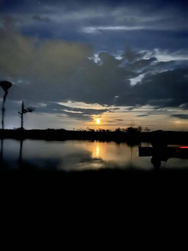 Moonrise with boat --Kimberly Godden Tanner