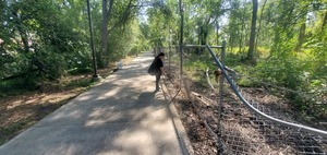 [Sara Jay picking up trash, 10:27:30, 30.8429134, -83.3000878]