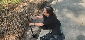 [Sara succeeds in getting plastic bottle through the fence, 10:29:47, 30.8428982, -83.3000206]