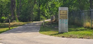 [Only sign says No Motorized Vehicles, with grafitti, 11:30:47, 30.8427480, -83.3012193]