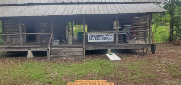 [Gretchen setting up at the cabin, 2025:06:06 09:10:16, 31.3465143, -83.1772631]
