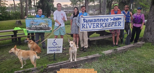 [Banners at Banks Lake --jsq for WWALS, 2025:06:11 19:56:50, 31.0350535, -83.0967092]