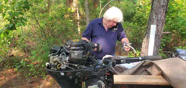 [Movie: Phil Hubbard working on the fuel pump (4.3M)]