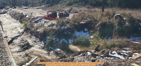 [The sewage bypass originally used manhole W0057 near Sherwood Drive feeder creek, 2025:01:25 12:28:44, 30.8527277, -83.3150186 --jsq for WWALS]