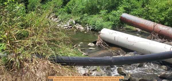 Movie: Sewage bypass pipes across Sugar Creek and Malia Thomas of WTXL TV, 2025:07:16 14:01:57, 30.8520597, -83.3147061 (23M) --jsq for WWALS