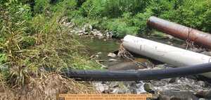 [Movie: Sewage bypass pipes across Sugar Creek and Malia Thomas of WTXL TV, 2025:07:16 14:01:57, 30.8520597, -83.3147061 (23M) --jsq for WWALS]