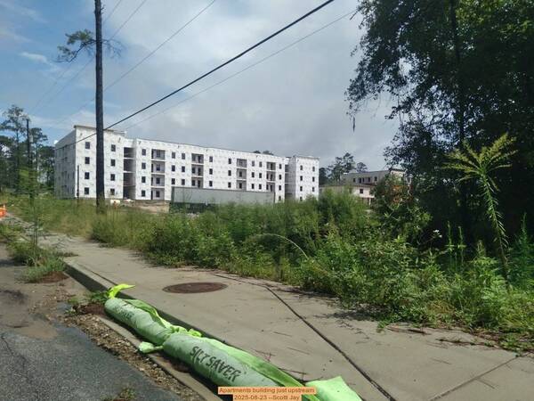 Apartments building just upstream, 2025-08-23 --Scotti Jay
