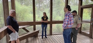 [Edwin McCook and Nic Brown explaining to VLPRA, 2025:09:27 10:04:11, 30.2468853, -83.2462012, Dowling Park River Camp]
