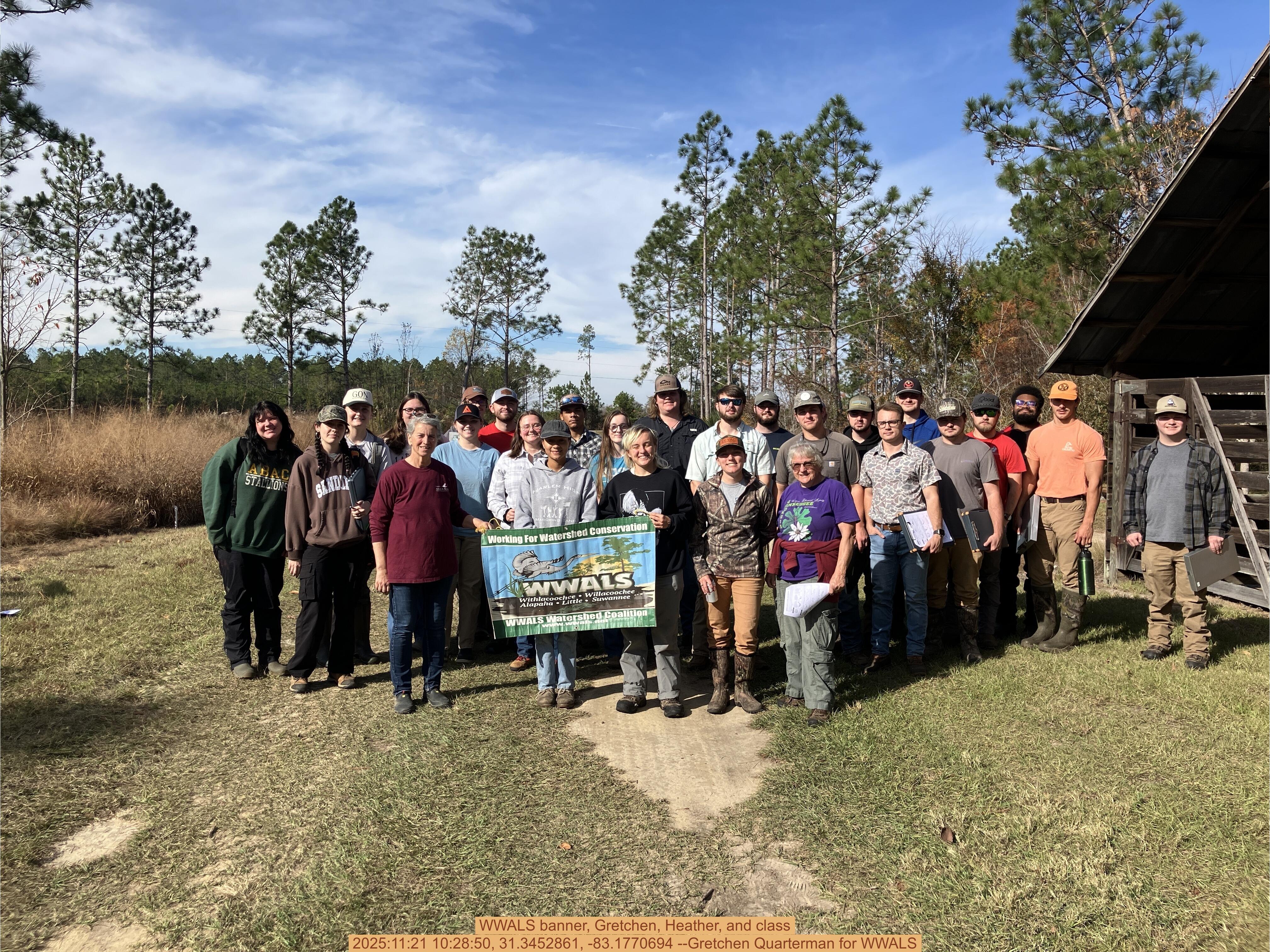 WWALS banner, Gretchen, Heather, and class, 2025:11:21 10:28:50, 31.3452861, -83.1770694 --Gretchen Quarterman for WWALS