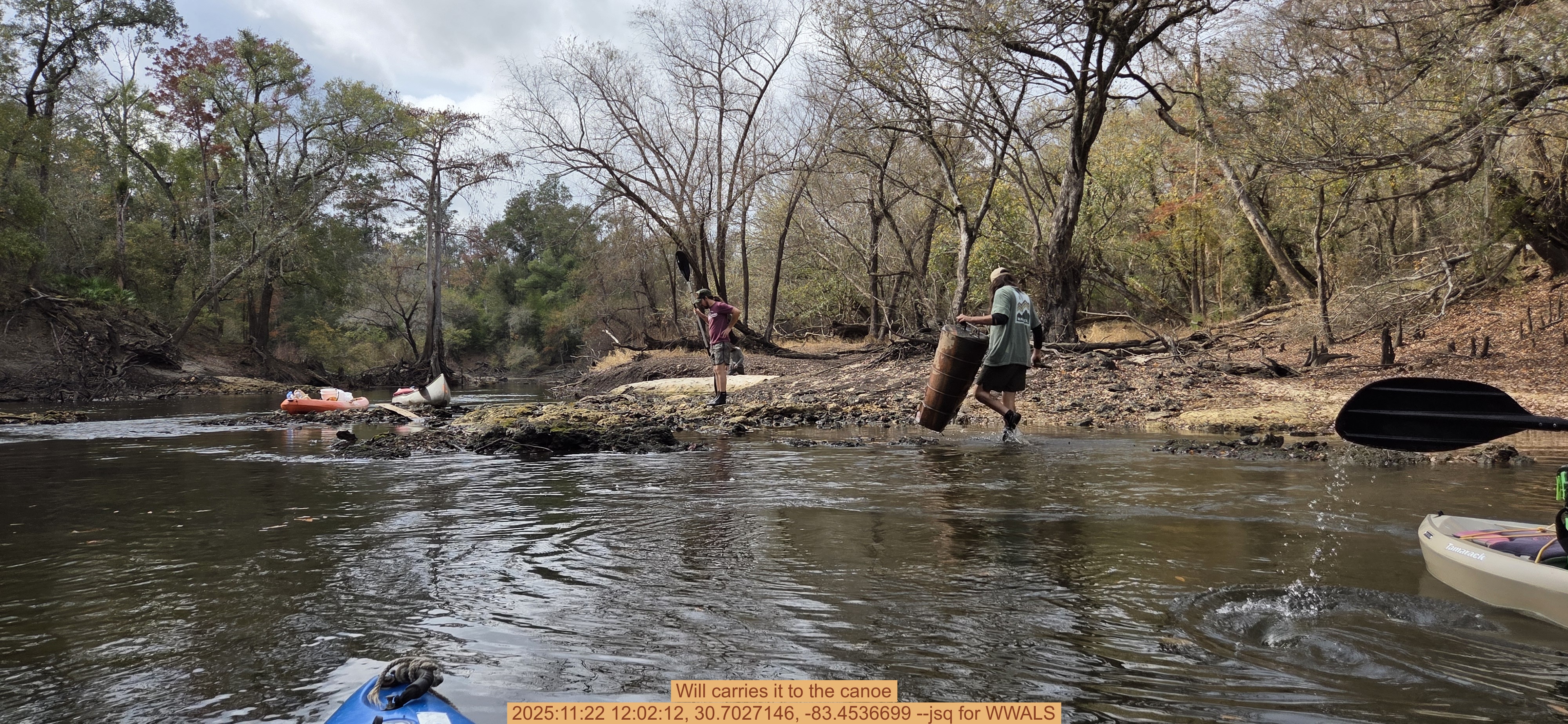 Will carries it to the canoe, 2025:11:22 12:02:12, 30.7027146, -83.4536699 --jsq for WWALS