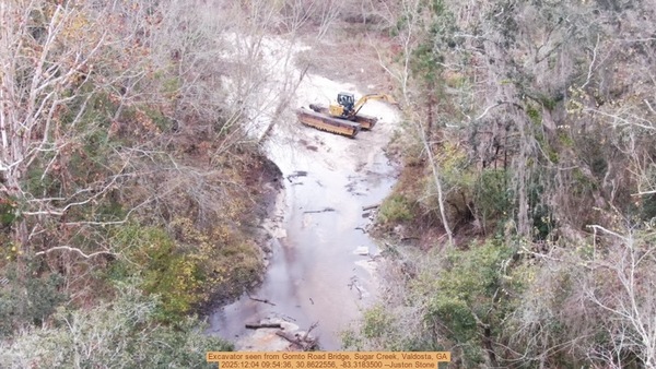 Excavator seen from Gornto Road Bridge, Sugar Creek, Valdosta, GA, 2025:12:04 09:54:36, 30.8622556, -83.3183500 --Juston Stone