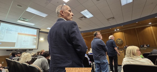 [Lineup of cave divers to object, 2026-01-13 --jsq for WWALS]