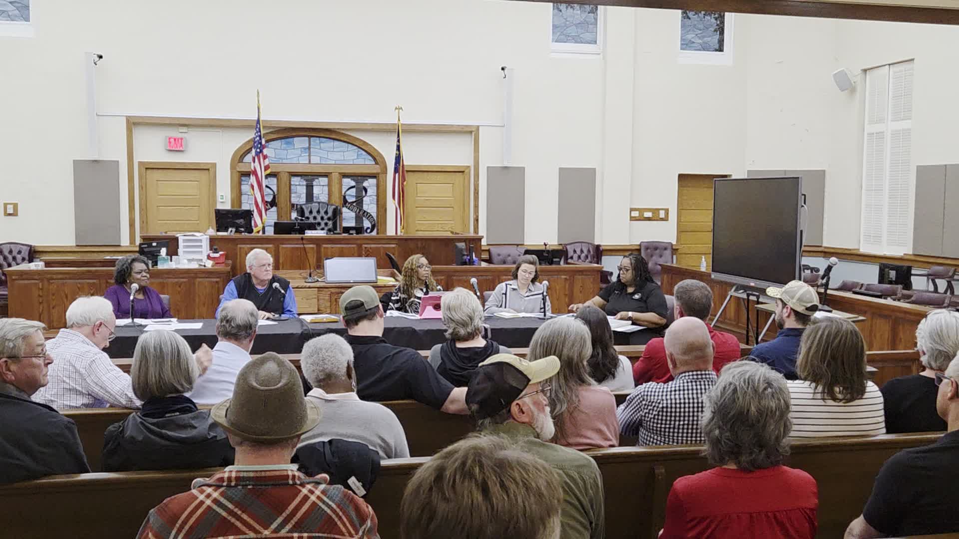 Movie: Inaudible, for, said they were working on a datacenter ordinance with the county commission, with buffers, setbacks, etc. No written evidence. (106M)