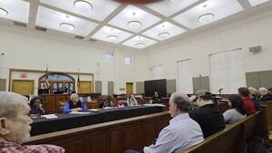 [Movie: Gary M. Granger, 424 Alapaha (River) Road, against, because of need for power distribution center, and would there be a firehouse and EMS on site, and would those be available to the community? Also local water wells, and more. (142M)]