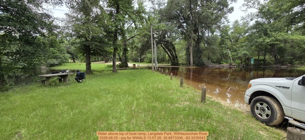 [Water above top of boat ramp, Langdale Park, Withlacoochee River, 2026:06:25 --jsq for WWALS 13:57:26, 30.8873306, -83.3235543]
