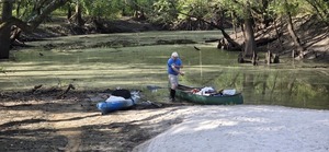 [Phil Hubbard with WWALS Old Town canoe, 2026:07:11 09:23:38, 30.8877174, -83.3236824]