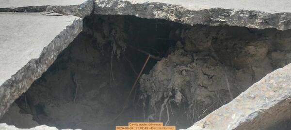 Cavity under driveway, 2026-06-04, 11:02:49 --Dennis Norman
